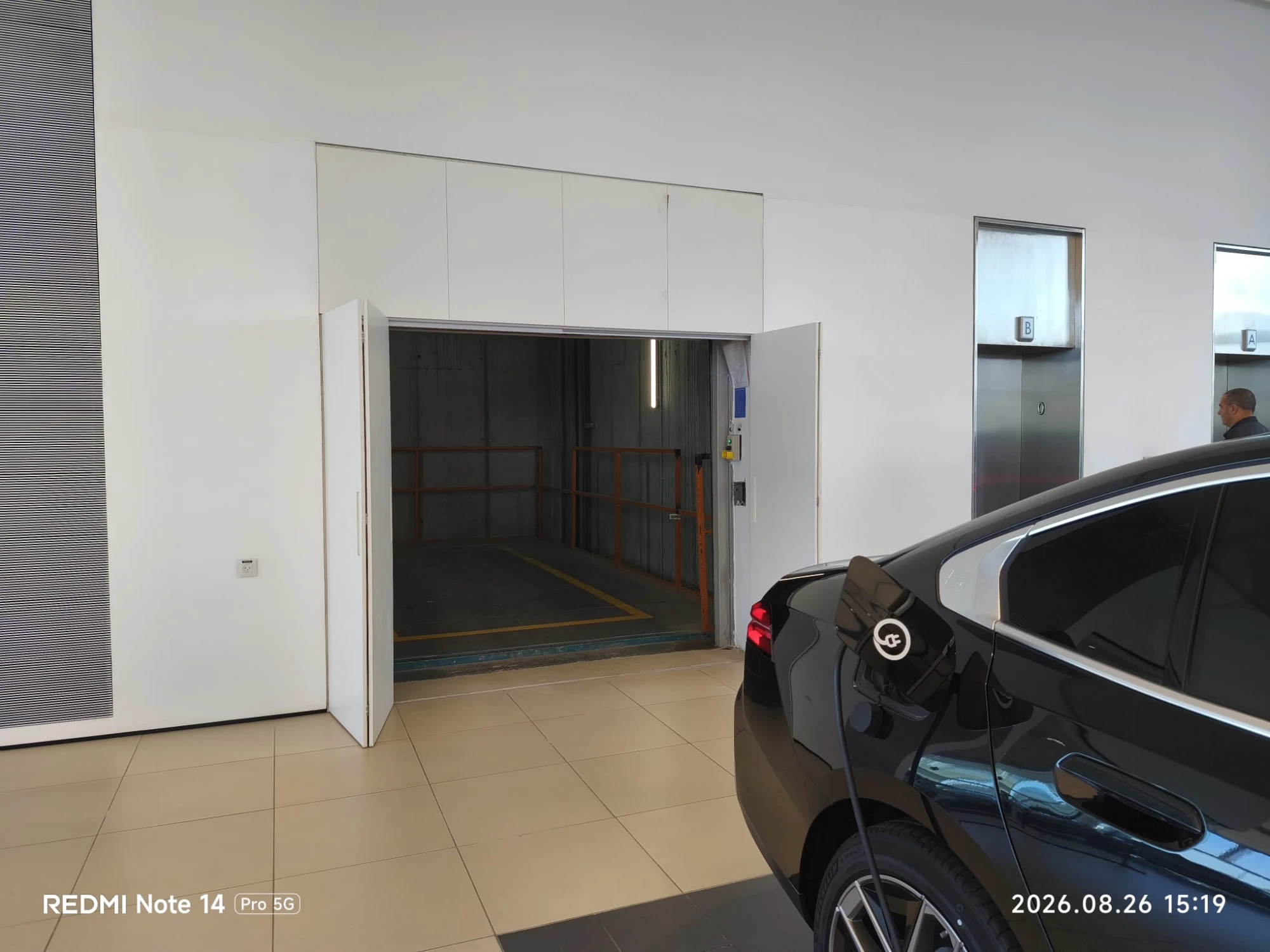 Car elevator door inside a showroom